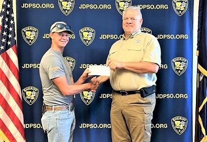 2-2022 Hayden LeJeune and Sheriff with check NEWSLETTER READY.jpg